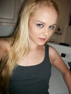 Petite blonde teen takes selfshot pictures of her perky tits and tight pussy for her boyfriend